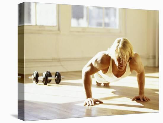 Young Man Preforming Push Up Exercise in Gym, New York, New York, USA-Chris Trotman-Premier Image Canvas