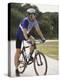 Young Man Sitting on a Bicycle-null-Premier Image Canvas