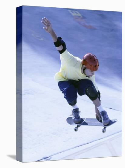 Young Man Skateboarding in Mid Air-null-Premier Image Canvas