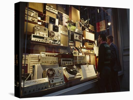 Young Men Men Look at a Window Display of Stereo and Recording Equipment, New York, NY, 1963-Yale Joel-Premier Image Canvas