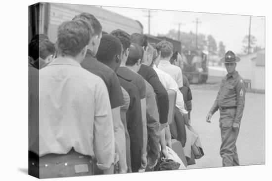 Young men who have been drafted wait in line to be processed into the US Army at Fort Jackson, SC-Warren K. Leffler-Premier Image Canvas