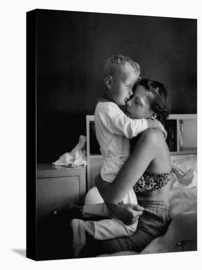 Young Mother Hugging One of Her Sons-Mark Kauffman-Premier Image Canvas