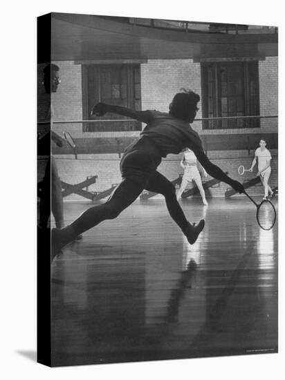 Young People Enjoying a Game of Badminton Inside of a Y.M.C.A-Ralph Crane-Premier Image Canvas