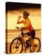 Young Woman Drinking Water Sitting on a Bicycle-null-Premier Image Canvas