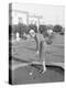 Young Woman Playing Mini Golf-null-Stretched Canvas