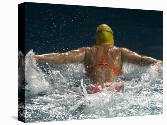 Young Woman Swimming the Butterfly Stroke in a Swimming Pool, Bainbridge Island, Washington, USA-null-Premier Image Canvas