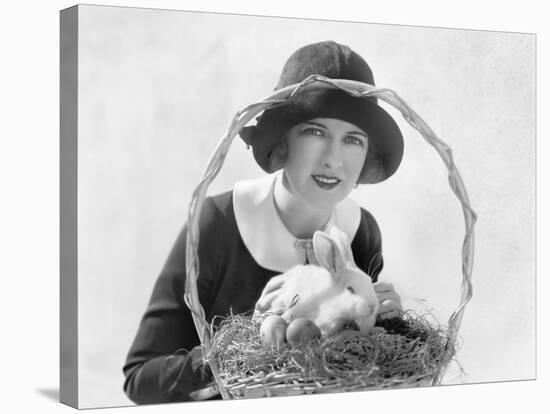 Young Woman with an Easter Basket and a Bunny-null-Stretched Canvas
