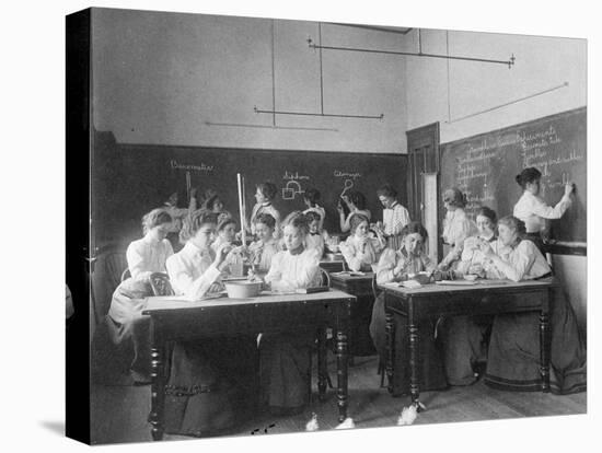 Young women performing atmospheric pressure experiments in normal school, Washington D.C., c.1899-Frances Benjamin Johnston-Premier Image Canvas