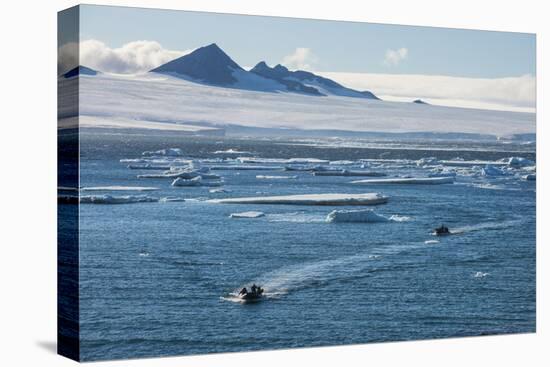 Zodiac with tourists cruising through the icebergs, Brown Bluff, Tabarin Peninsula, Antarctica, Pol-Michael Runkel-Premier Image Canvas