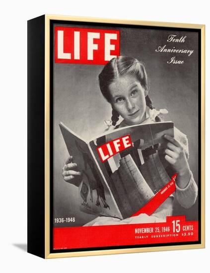 10th Anniversary Features Young Girl Reading First Issue of LIFE, November 25, 1946-Herbert Gehr-Framed Premier Image Canvas