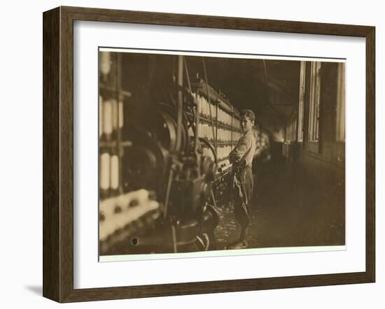 11 or 12 years old Saturday worker in the mule-spinning room at Jackson Mill, Fiskeville, RI-Lewis Wickes Hine-Framed Photographic Print