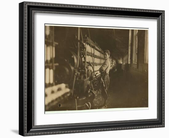 11 or 12 years old Saturday worker in the mule-spinning room at Jackson Mill, Fiskeville, RI-Lewis Wickes Hine-Framed Photographic Print