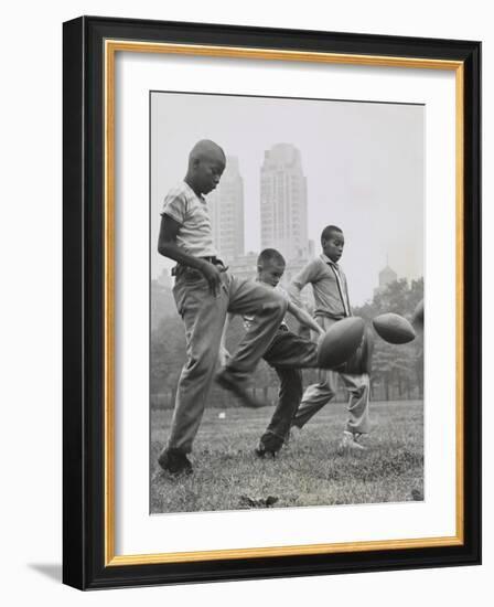 11 Year Olds in the 'Punt, Pass, and Kick' Competition at Heckscher Playground in Central Park-null-Framed Photo