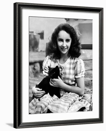 13 Year Old Actress Elizabeth Taylor Outside, Holding One of Her Many Pets, a Black Cat Named Jill-Peter Stackpole-Framed Premium Photographic Print