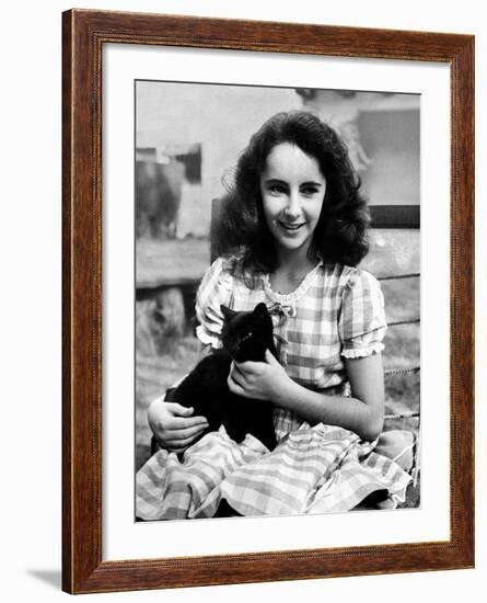 13 Year Old Actress Elizabeth Taylor Outside, Holding One of Her Many Pets, a Black Cat Named Jill-Peter Stackpole-Framed Premium Photographic Print