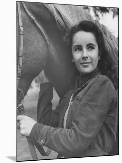 13-Yr-Old Actress Elizabeth Taylor with Her Favorite Pet, a Horse Named Peanuts-Peter Stackpole-Mounted Premium Photographic Print