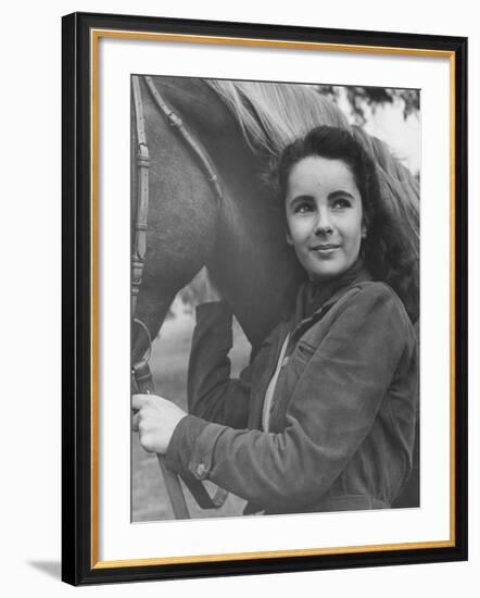 13-Yr-Old Actress Elizabeth Taylor with Her Favorite Pet, a Horse Named Peanuts-Peter Stackpole-Framed Premium Photographic Print
