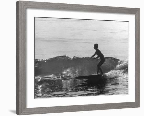 16 Yr. Old Surfer Kathy Kohner Riding a Wave-Allan Grant-Framed Premium Photographic Print