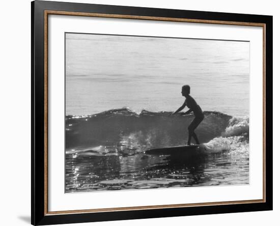 16 Yr. Old Surfer Kathy Kohner Riding a Wave-Allan Grant-Framed Premium Photographic Print