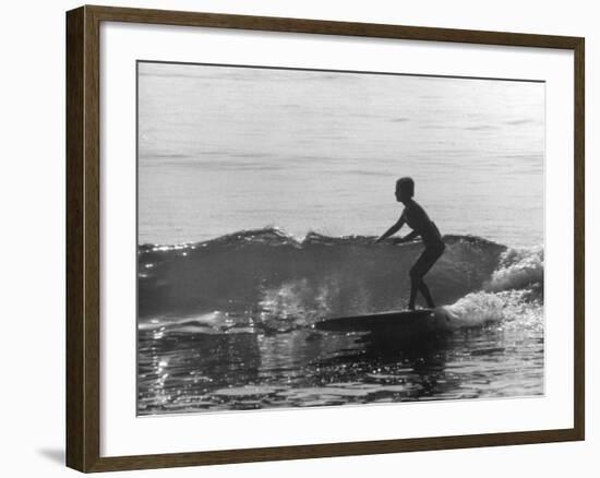 16 Yr. Old Surfer Kathy Kohner Riding a Wave-Allan Grant-Framed Premium Photographic Print