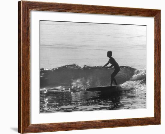 16 Yr. Old Surfer Kathy Kohner Riding a Wave-Allan Grant-Framed Premium Photographic Print