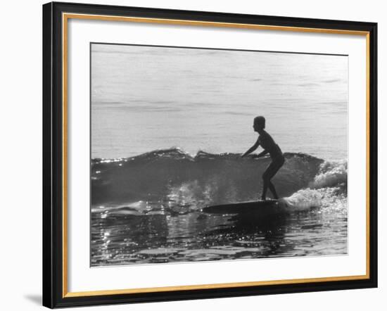 16 Yr. Old Surfer Kathy Kohner Riding a Wave-Allan Grant-Framed Premium Photographic Print