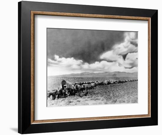 1870s-1880s Montage of Covered Wagons Crossing the American Plains-null-Framed Photographic Print