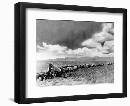 1870s-1880s Montage of Covered Wagons Crossing the American Plains-null-Framed Photographic Print