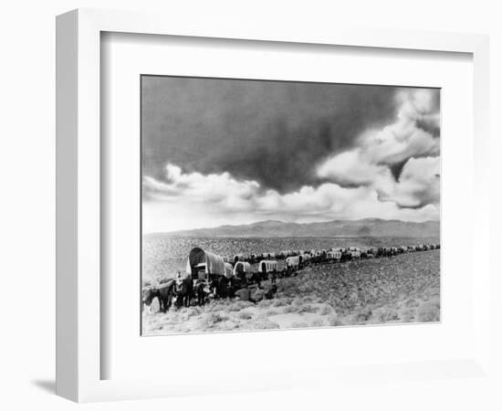 1870s-1880s Montage of Covered Wagons Crossing the American Plains-null-Framed Photographic Print