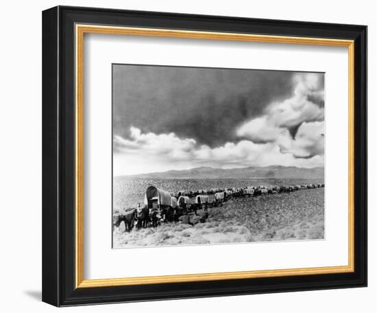 1870s-1880s Montage of Covered Wagons Crossing the American Plains-null-Framed Photographic Print