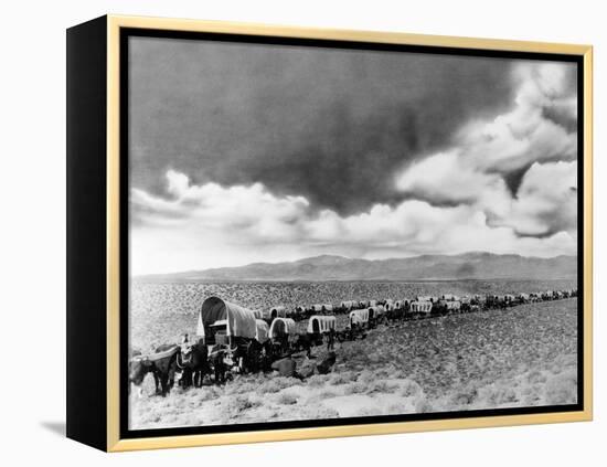 1870s-1880s Montage of Covered Wagons Crossing the American Plains-null-Framed Premier Image Canvas