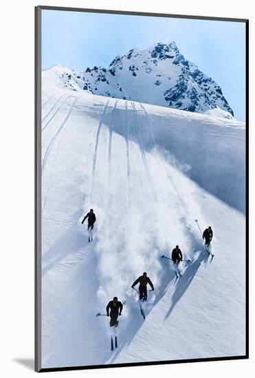 1920s 1930s FIVE ANONYMOUS MEN SKIING DOWN SNOW COVERED ALPS SWITZERLAND-H. Armstrong Roberts-Mounted Photographic Print