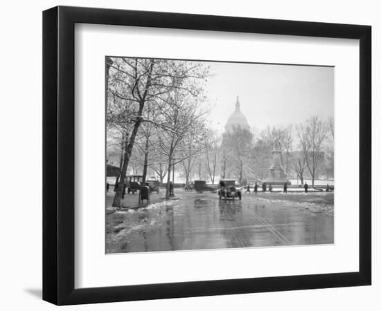 1920s-1930s the Capitol Building and Old Car Traffic in Winter Washington DC-null-Framed Photographic Print