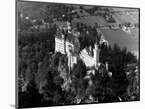 1930s-1940s Aerial of Neuschwanstein Castle-null-Mounted Photographic Print