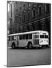 1930s-1940s Public Transportation Trackless Trolley Electric Bus About to Round Street Corner-null-Mounted Photographic Print