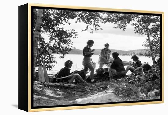 1930s 5 GIRLS AROUND CAMP FIRE NEAR LAKE CANOE SUMMER YOUTH ALGONQUIN PARK CANADA-H. Armstrong Roberts-Framed Premier Image Canvas