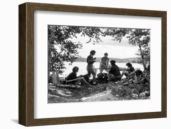 1930s 5 GIRLS AROUND CAMP FIRE NEAR LAKE CANOE SUMMER YOUTH ALGONQUIN PARK CANADA-H. Armstrong Roberts-Framed Photographic Print