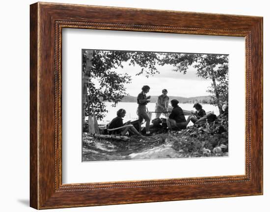 1930s 5 GIRLS AROUND CAMP FIRE NEAR LAKE CANOE SUMMER YOUTH ALGONQUIN PARK CANADA-H. Armstrong Roberts-Framed Photographic Print