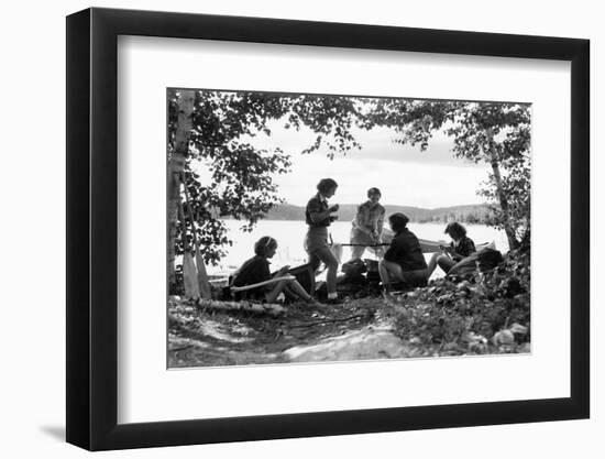 1930s 5 GIRLS AROUND CAMP FIRE NEAR LAKE CANOE SUMMER YOUTH ALGONQUIN PARK CANADA-H. Armstrong Roberts-Framed Photographic Print