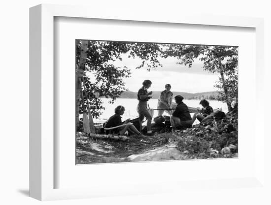 1930s 5 GIRLS AROUND CAMP FIRE NEAR LAKE CANOE SUMMER YOUTH ALGONQUIN PARK CANADA-H. Armstrong Roberts-Framed Photographic Print