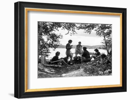 1930s 5 GIRLS AROUND CAMP FIRE NEAR LAKE CANOE SUMMER YOUTH ALGONQUIN PARK CANADA-H. Armstrong Roberts-Framed Photographic Print