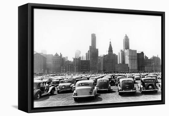 1930s AUTOMOBILES ON MICHIGAN AVENUE PARKING LOT WITH SKYLINE OF BUILDINGS IN BACKGROUND CHICAGO...-H. Armstrong Roberts-Framed Premier Image Canvas