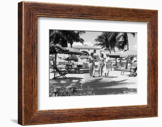 1930s THREE YOUNG WOMEN STANDING TALKING IN CABANA AREA OF CLUB NAUTILUS HOTEL MIAMI BEACH FLORI...-H. Armstrong Roberts-Framed Photographic Print