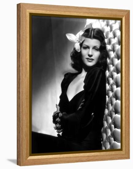 , 1940: American actress Rita Hayworth (1918 - 1987) with an exotic flower in her hair (Photo by A.-null-Framed Stretched Canvas