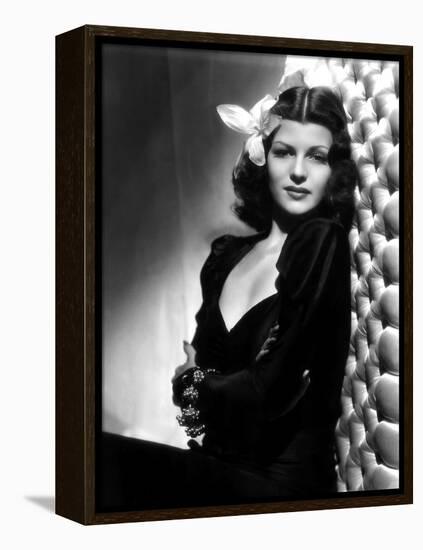 , 1940: American actress Rita Hayworth (1918 - 1987) with an exotic flower in her hair (Photo by A.-null-Framed Stretched Canvas