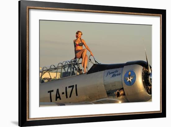 1940's Style Pin-Up Girl Sitting on the Cockpit of a World War II T-6 Texan-null-Framed Photographic Print