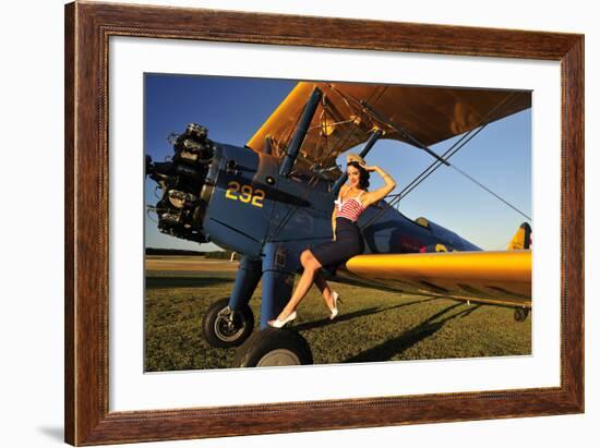 1940's Style Pin-Up Girl Sitting on the Wing of a Stearman Biplane-null-Framed Premium Photographic Print