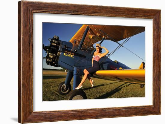 1940's Style Pin-Up Girl Sitting on the Wing of a Stearman Biplane-null-Framed Photographic Print