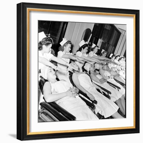 1940S Women Learning Facials and Beauty Techniques at a Beauty School-Nina Leen-Framed Photographic Print