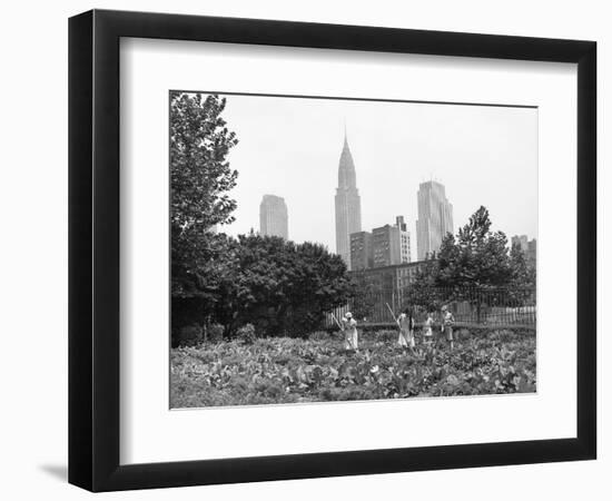 1943 Children Working in Victory Gardens in St. Gabriel's Park New York City Chrysler Building-null-Framed Photographic Print